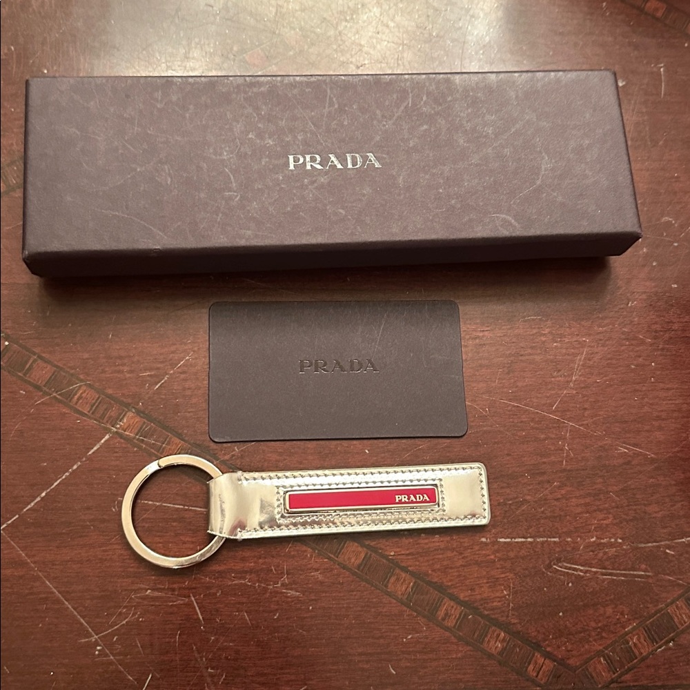Prada Metallic and Red Key Holder